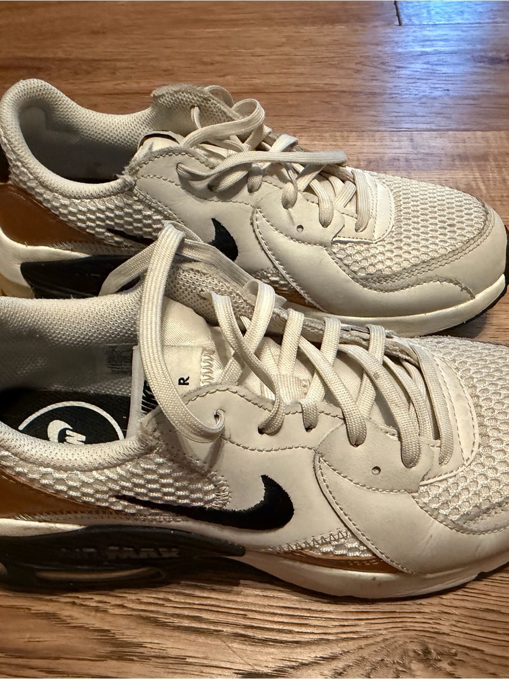 Nike Women's Cream and Black Low-Top Sneakers with Gold Accent